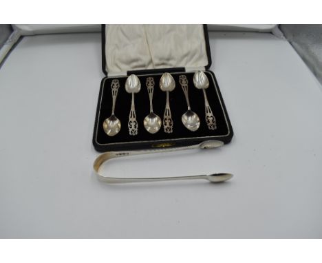 A cased set of six silver teaspoons having cut out terminals, Birmingham 1920, William Henry Leather, and a pair of Georgian 