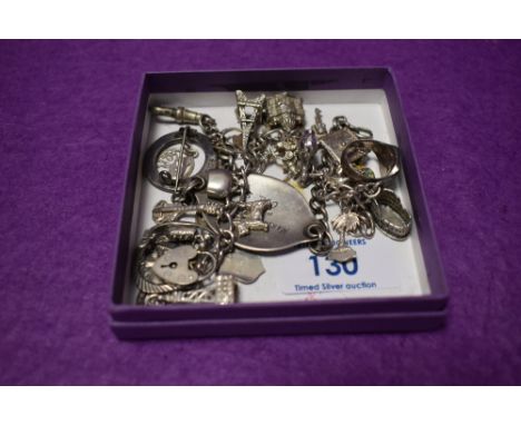 A selection of white metal and HM silver jewellery including signet ring, 1868 sixpence, charm bracelet, loose charms, brooch