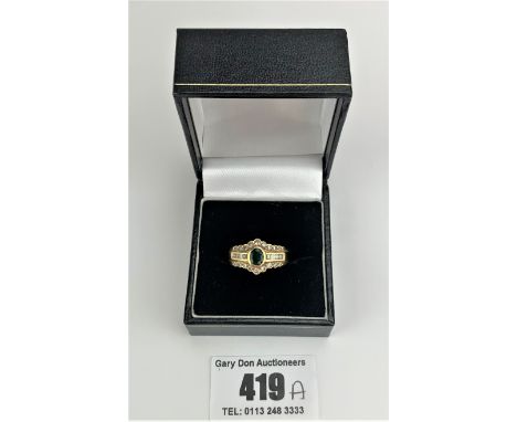 18k Gold emerald and diamond set dress ring, size P/Q, W:4.8 gms