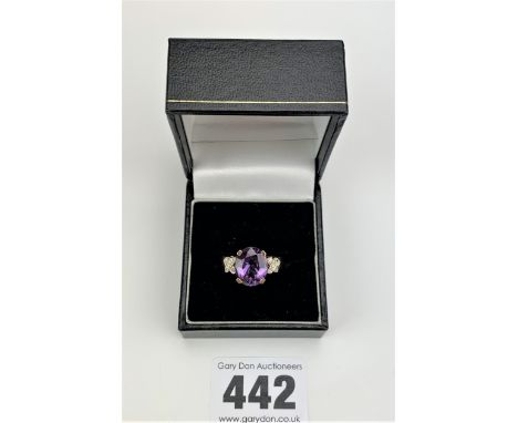 9k gold diamond and purple stone ring, size O, w: 4.2 gms