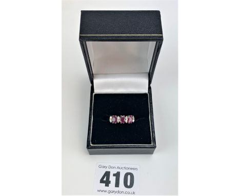 9k gold diamond and red stone ring, size O/P, w: 2.5 gms