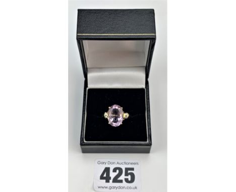 9k gold and purple stone with diamond chips ring, size O/P, w: 3.6 gms