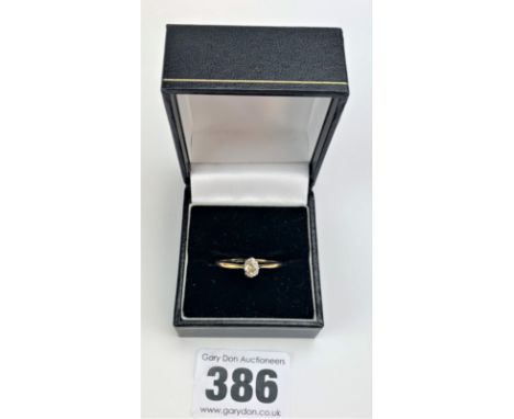 18k gold and oval diamond solitaire ring, size U, w: 2.3 gms. Old cut approx .45 points.Colour J, Clarity SI3/PI