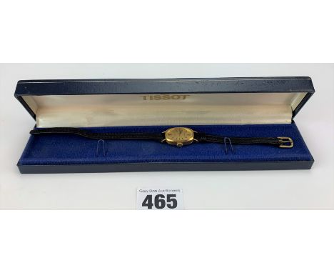 18k gold Tissot ladies watch with leather strap, running. Total w: 12 gms