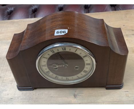 2 hole mantle clock. 8"h x 13"w x 5"d