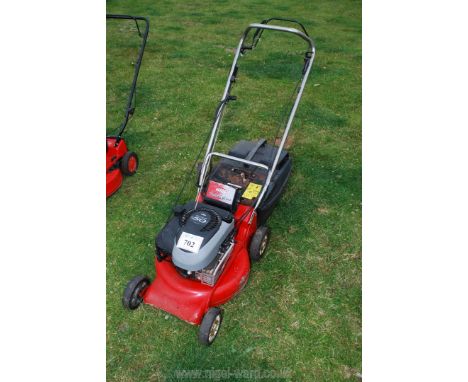 A Rover Powerstart Deluxe lawn mower with Briggs &amp; Stratton engine, (engine turns, good compression), grass collector box