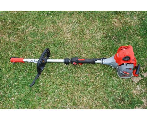 A MITOX strimmer engine, no attachment. Good compression.