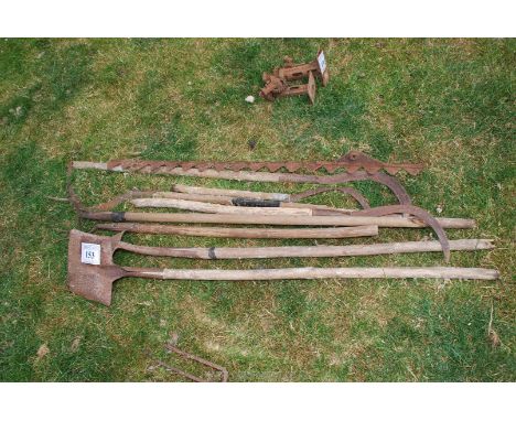 A bundle of tools including mower blade 54".