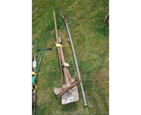 A quantity of tools including a pick, a sledge, a hook, a shovel, etc.,