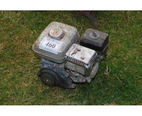 A Honda style stationary engine, (good compression, unable to start as no fuel present).