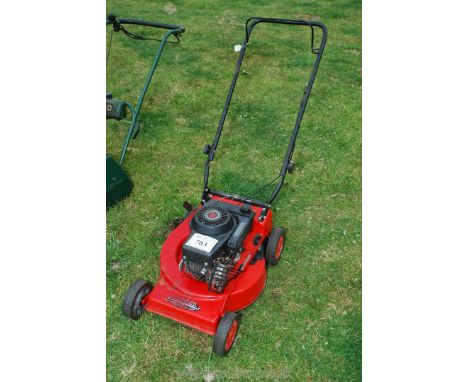 A Rover Raider self-propelled mower (no grass box), engine very tight - sold as seen.