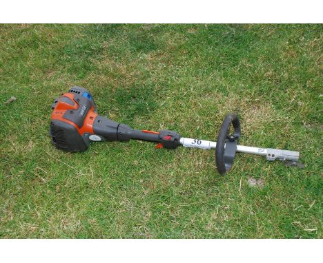 A Husqvarna 525 LK strimmer engine, no attachments. Good compression.