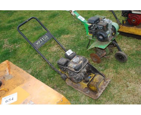A Whacker plate with Honda style engine (good compression) (unable to start as no fuel present).