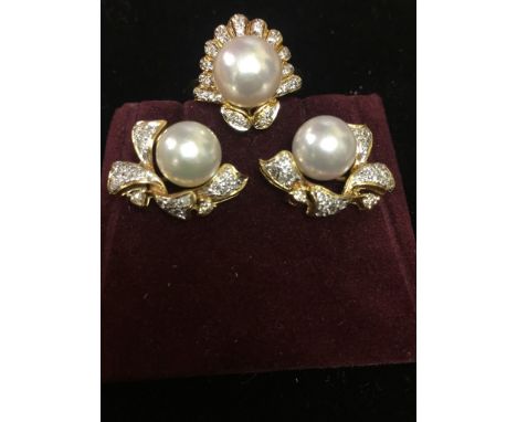 A 14k pearl and diamond ring; together with earrings