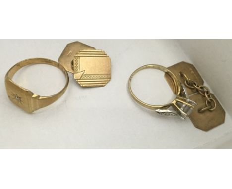 A gold ring and cufflinks