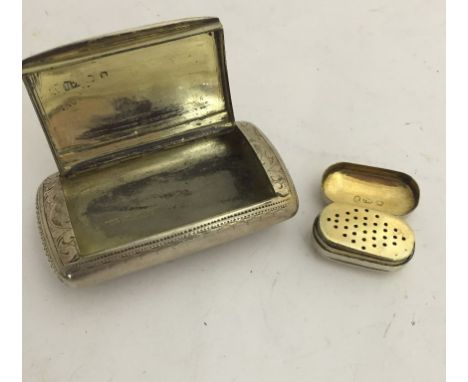 A silver snuff box; together with Georgian vinaigrettes