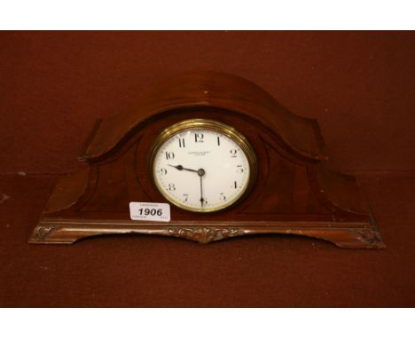 1920's Mahogany dome shaped mantel clock, the enamel dial with Arabic numerals inscribed Kendal & Dent