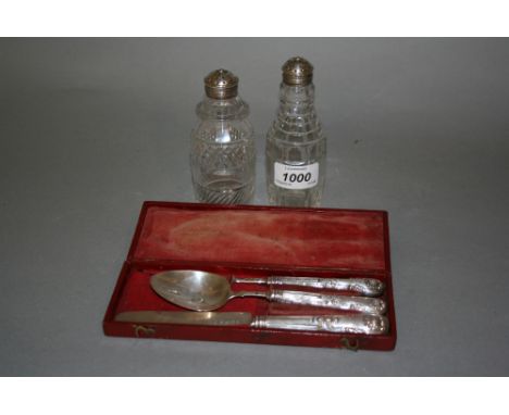 Pair of early 19th Century cut glass silver mounted peppers dated 1831 together with a William IV silver knife, spoon and for