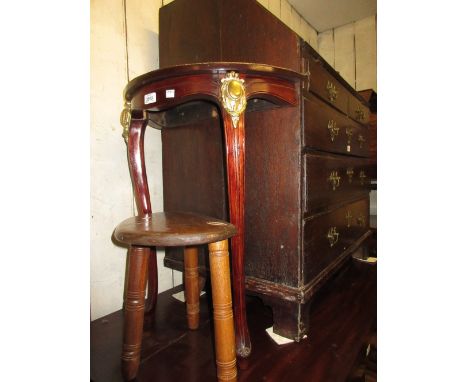 Pair of stained beechwood half round console tables with leather inset tops and gilt brass mounts