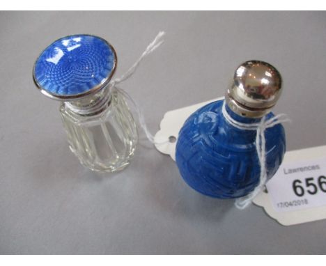 Blue porcelain perfume bottle with white metal neck band, 6.5cms high, together with a faceted clear glass bottle with silver