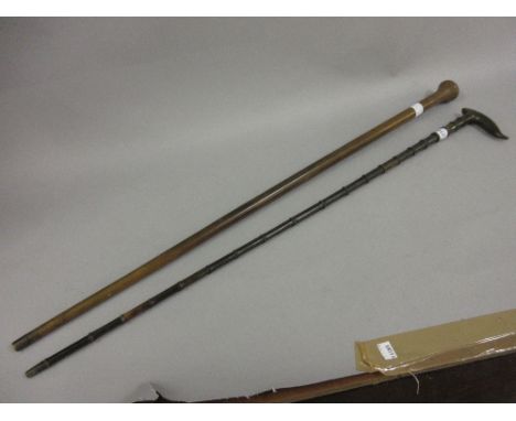 Horn sectional walking cane, together with a horn sectional walking stick