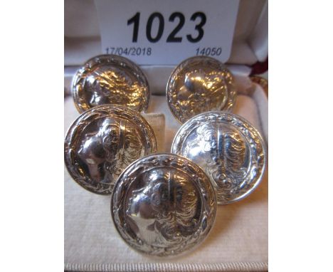 Set of five sterling silver buttons decorated in high relief with profile portrait of a young girl