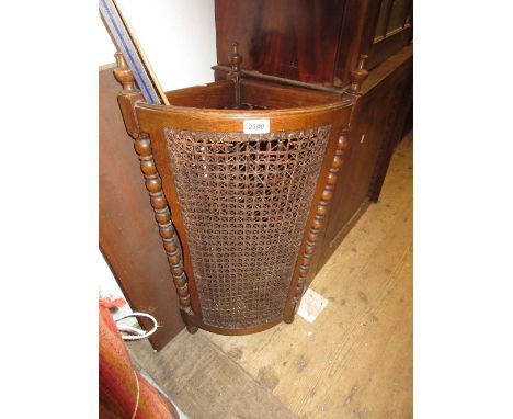 1930's Oak and caned corner stick stand