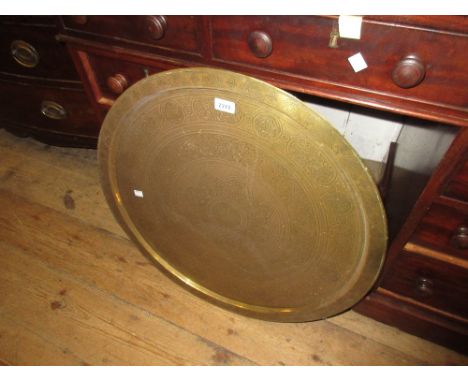 Circular brass tray top occasional table on a folding stand, small square stool on turned supports and an Edwardian inlaid ma