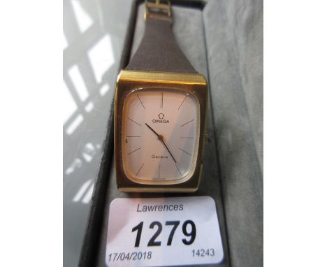 Omega Geneva gentleman's rectangular gold plated wristwatch, the white enamel dial with baton numerals on a leather strap wit