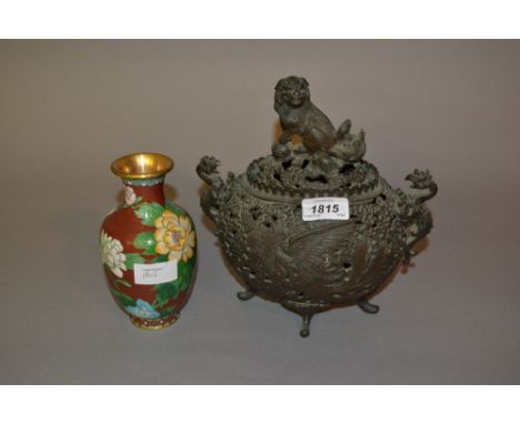 Oriental dark patinated bronze censer with dog of foe cover, together with a cloisonne baluster form vase