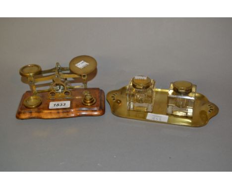 Small pair of brass postal scales with weights together with a brass two bottle inkstand