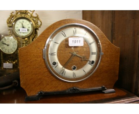 Mid 20th Century oak cased three train Westminster chiming mantel clock with silvered chapter ring inscribed Andrew