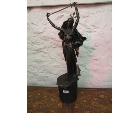 After Franz Bergman, 20th Century patinated bronze figure of a Moorish dancing girl with a sword, standing on a Persian rug, 
