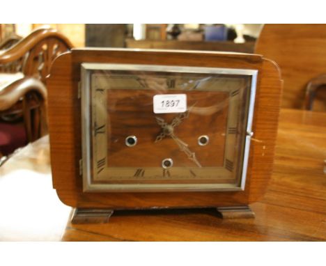 Art Deco walnut three train mantel clock together with an oak single train dome topped mantel clock