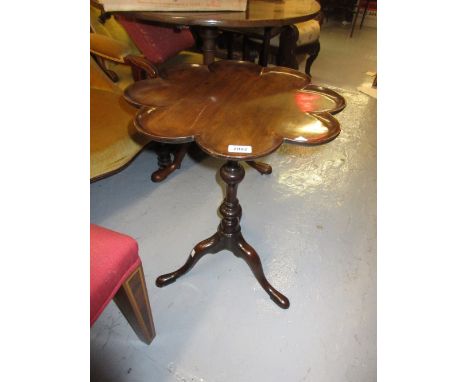 Small 19th Century mahogany pedestal occasional table, the shaped dish top above a turned column support and tripod base