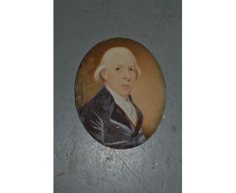 Early 19th Century watercolour, portrait miniature on ivory of a gentleman wearing a red coat, unframed