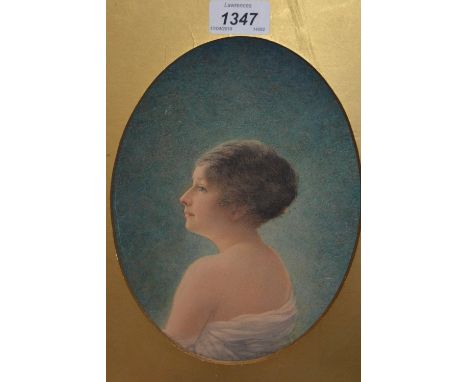 Late 19th / early 20th Century head and shoulder portrait of a lady, signed Louis Goddard, oval mounted, unframed, 8ins x 6.5