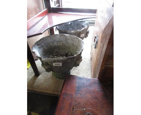 Two small lead pedestal garden pots together with a lead rain water hopper