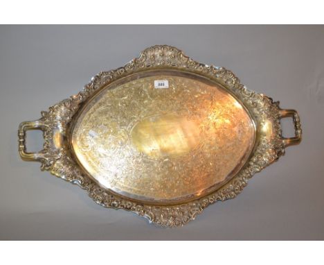 Large 19th Century silver plated oval two handled tray with embossed floral border and engraved centre panel