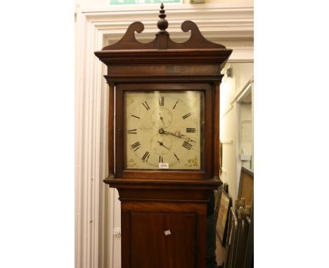 George III mahogany longcase clock, the square hood above a panelled door, plinth base and bracket feet, the painted dial wit