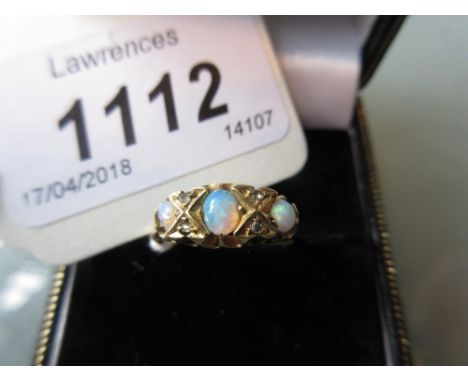 18ct Yellow gold opal and diamond chip set ring