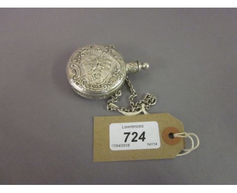 Continental silver (800 mark) perfume bottle with embossed decoration suspended from a chain