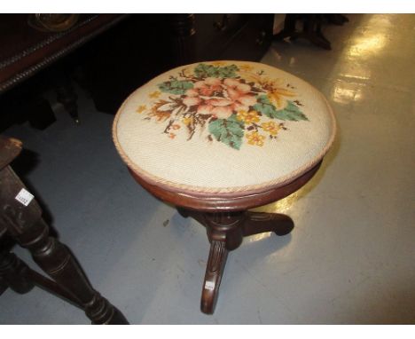 Victorian circular mahogany adjustable piano stool on turned carved column with tripod supports