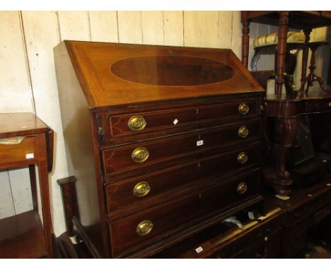 George III mahogany and chequer line inlaid bureau, the fall front enclosing a fitted interior above four graduated drawers w