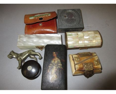 19th Century rectangular papier mache snuff box, the cover painted with a lady together with a quantity of various other boxe
