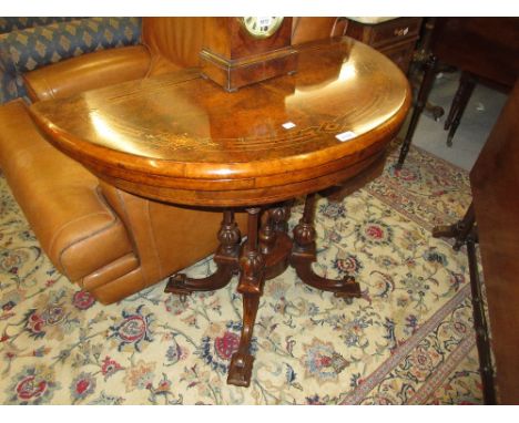 19th Century burr walnut line inlaid D-shaped fold over card table with baize lined interior on four slender carved and turne