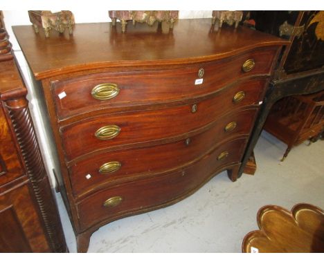 Mahogany and line inlaid serpentine fronted four drawer chest with oval brass handles and escutcheons on bracket feet (with a