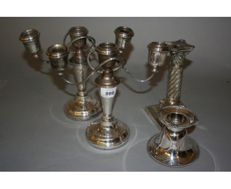 Pair of silver plated three branch candelabra and two other candle sticks