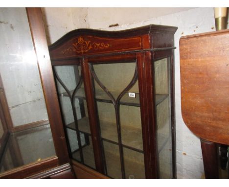 Edwardian mahogany two door display cabinet with painted decoration raised on square tapering supports (at fault) together wi