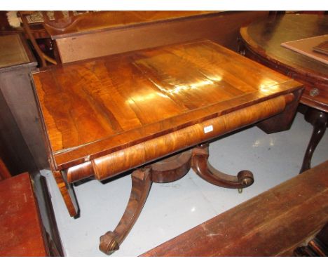 Late Regency rosewood and brass inlaid drop-leaf sofa table, the figured crossbanded top above a deep moulded frieze, the qua